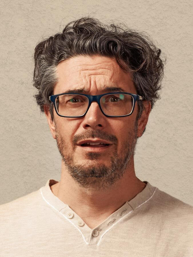 Messy Curly Quiff Medium Length Hairstyle for Men -Harptimes.com