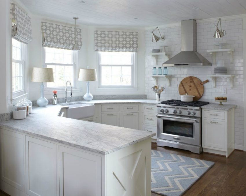 antique_white_kitchen_cabinets_with_black_granite_countertops
