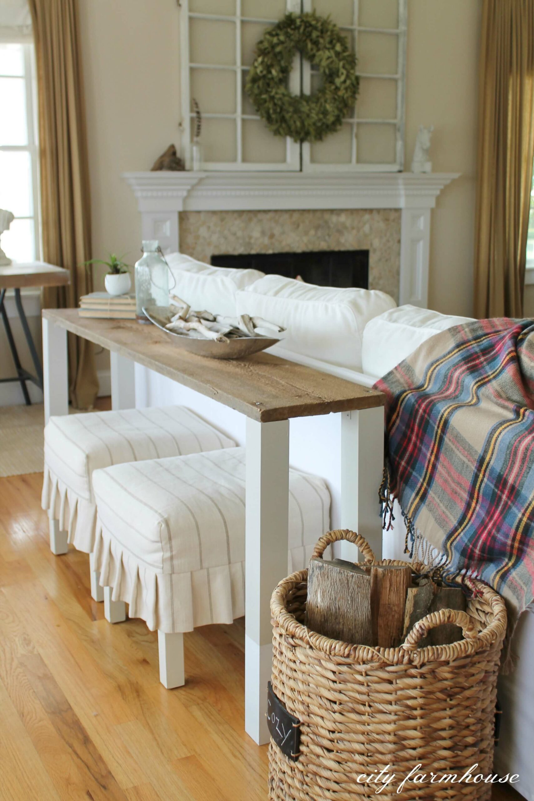 console table behind couch